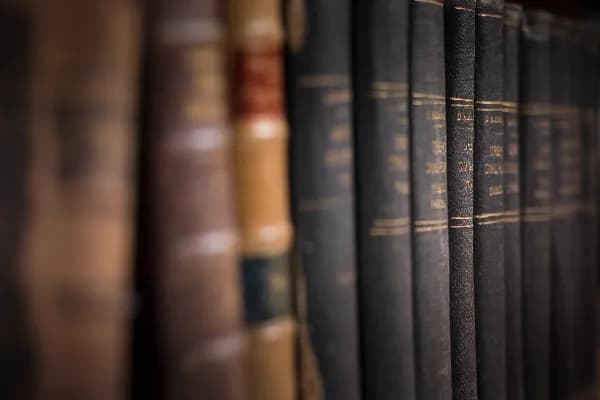 Rows of law books on shelves.